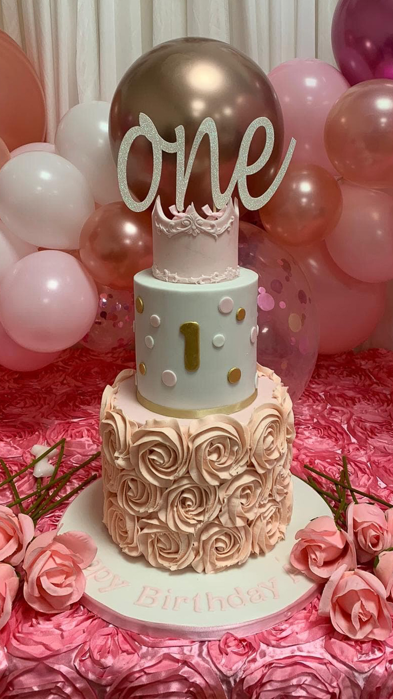Pretty two-tier Birthday cake with princess crown