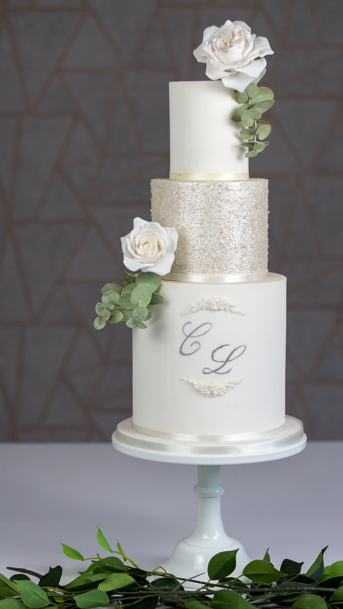 Stylish Classic White Wedding Cake with Sugar O'Hara Roses and Eucalyptus